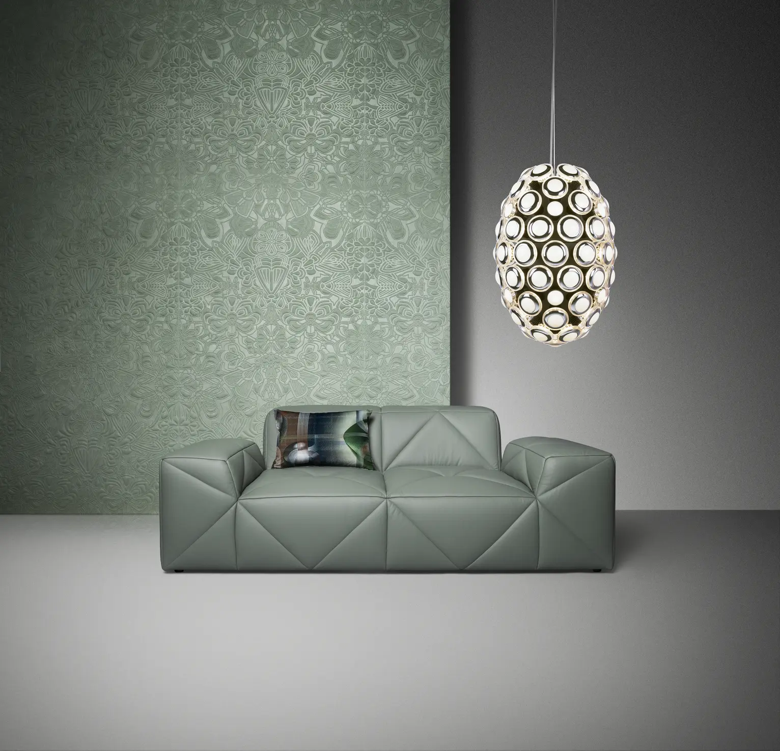 Poetic composition of Mimic Moth Wallcovering with BFF Sofa and Iconic Eyes suspension light